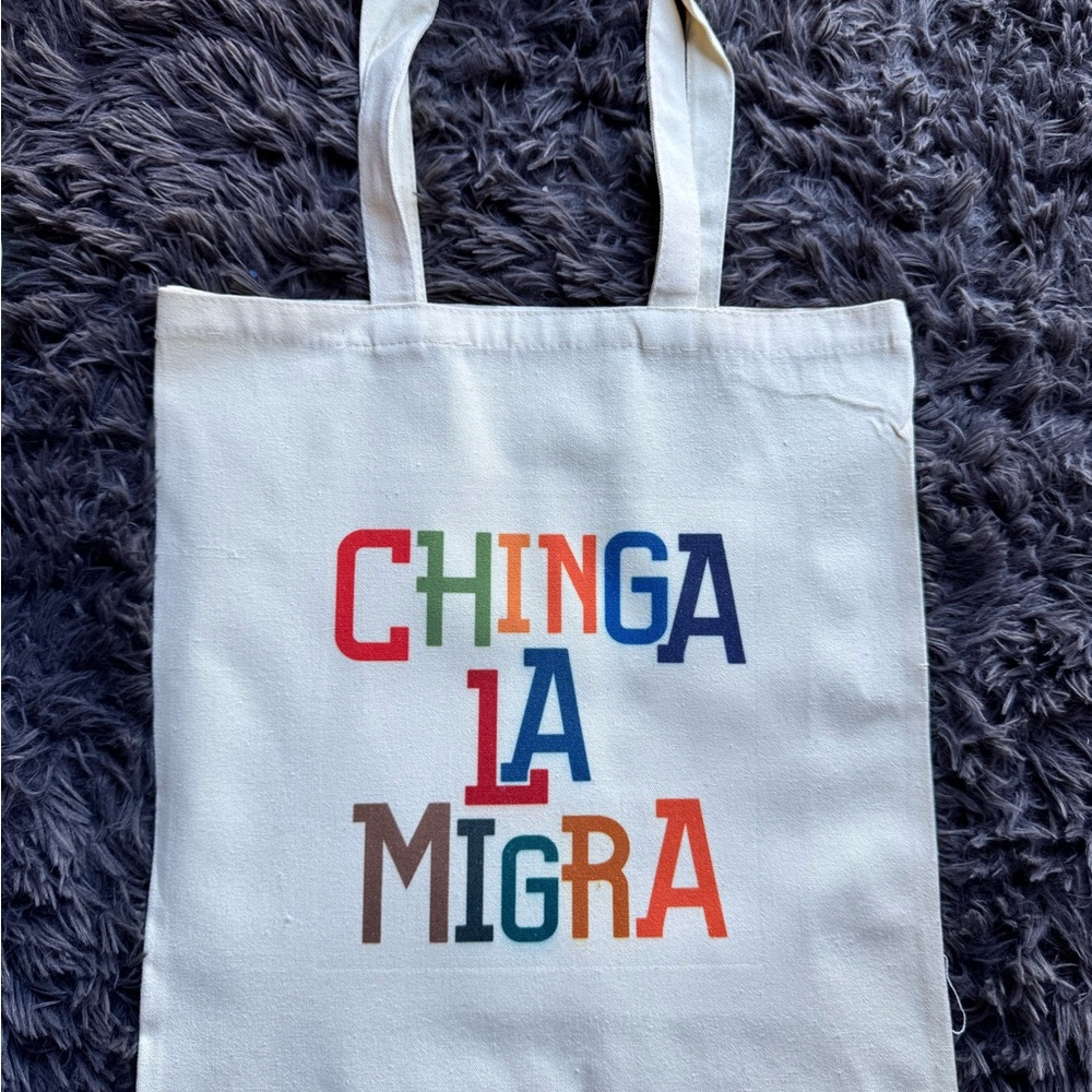 White and Red Canvas Tote Bag with Bold Text Design